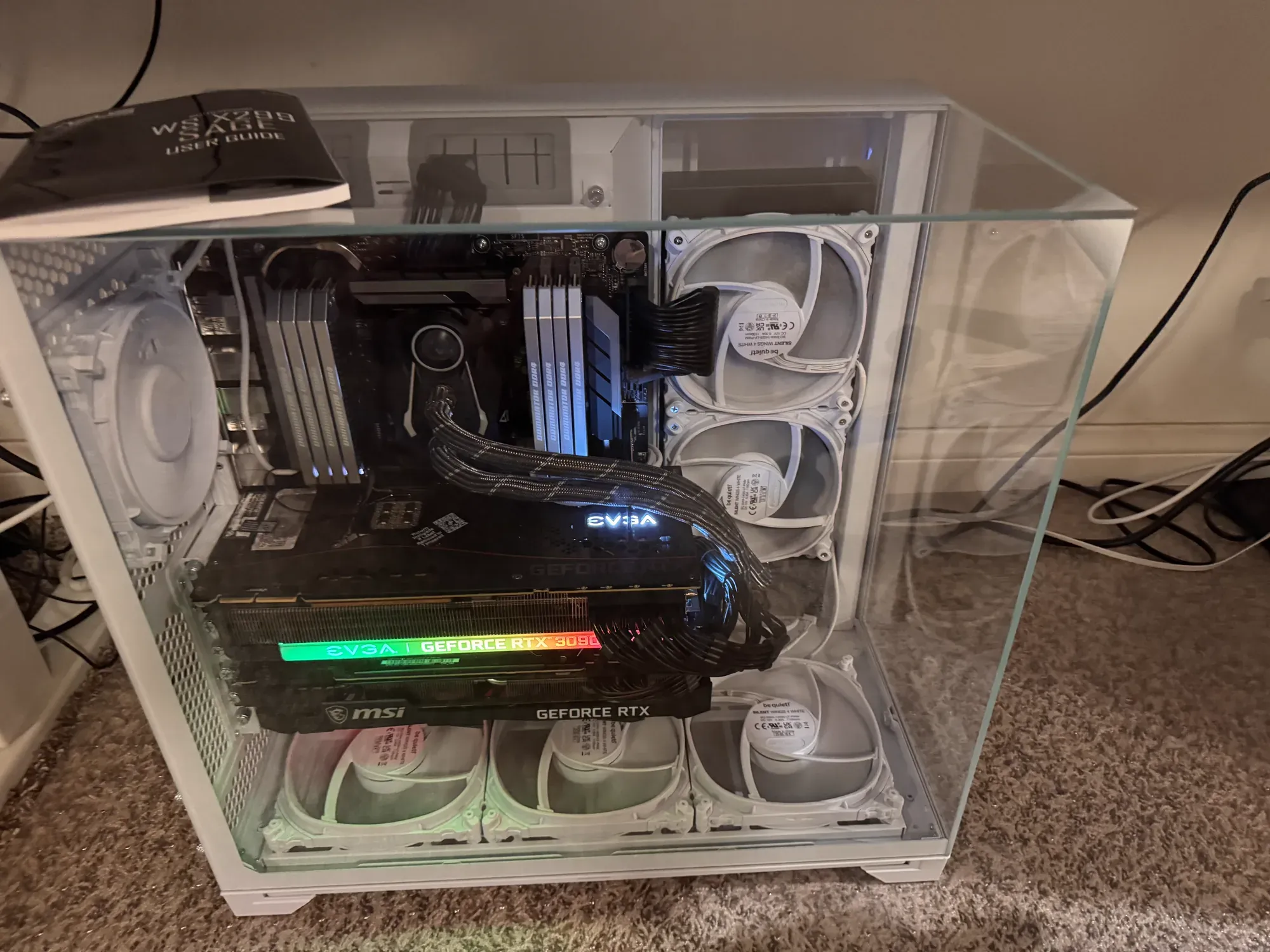 The rebuilt workstation with two RTX 3090s packed into a white glass case